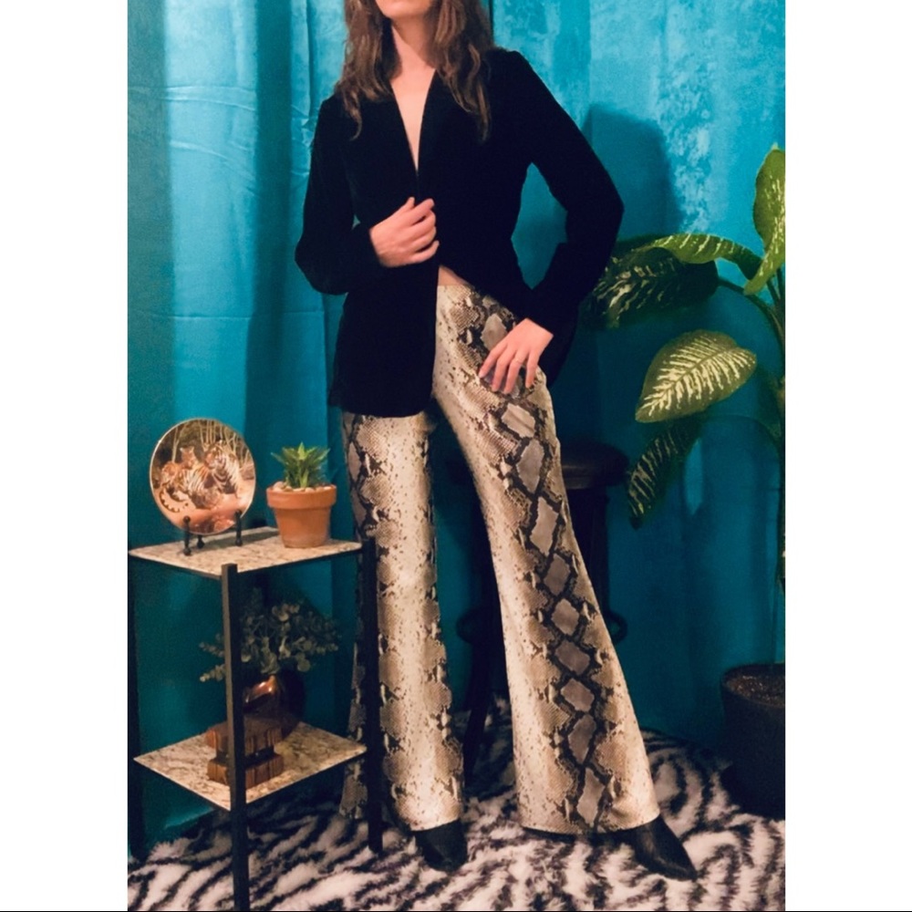 Reptilian Flare 🐍⚡️
Sheened Python Print Flared Pants